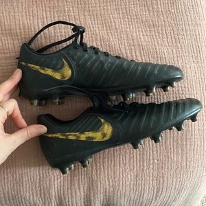 Gold Nike soccer cleats